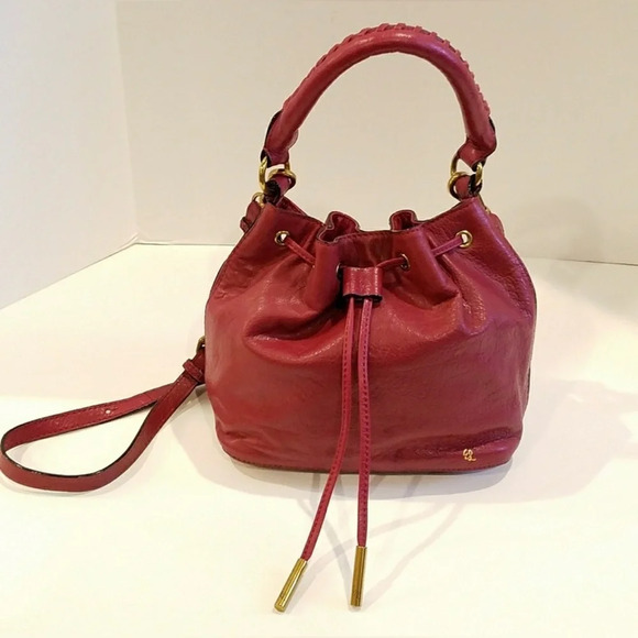 Elliott Lucca Handbags - Vintage Elliott Lucca Red Cranberry Pebbled Leather Drawstring Bag with tassels